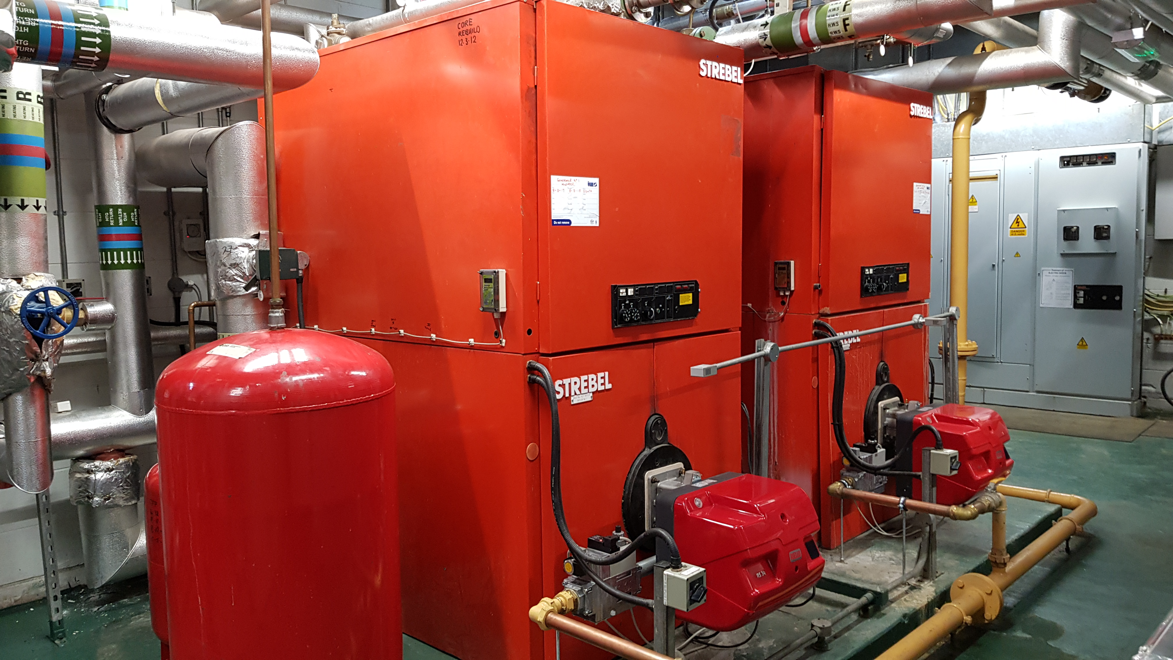 Commercial Strebel boilers and pipework in a plant room